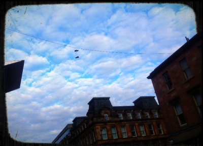 Shoes hanging in the sky in Glasgow